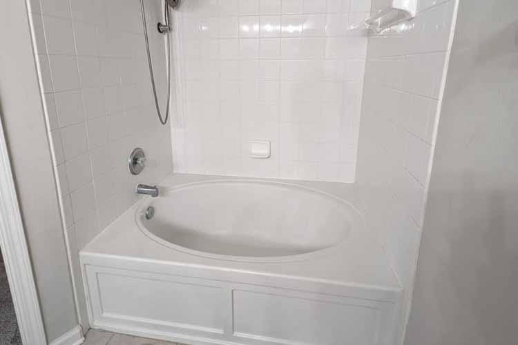 white bathtub and shower